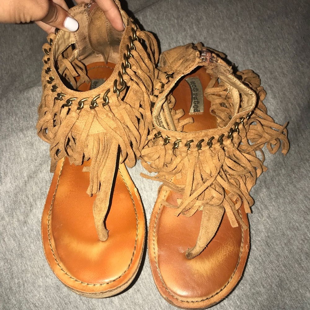 “Not rated” sandals